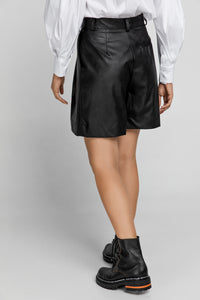 Black Faux Leather Bermuda Shorts by Conquista Fashion